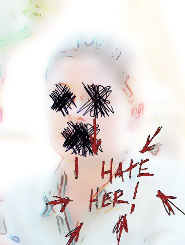 Photo of friend vandalised with words 'I hate her!'